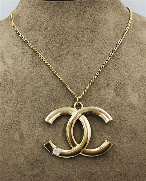 chanel classic cc logo necklace price|Chanel cc logo pendant necklace.